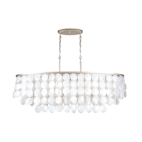 White capiz shell linear chandelier with cascading round shell discs and champagne-finished metal frame.