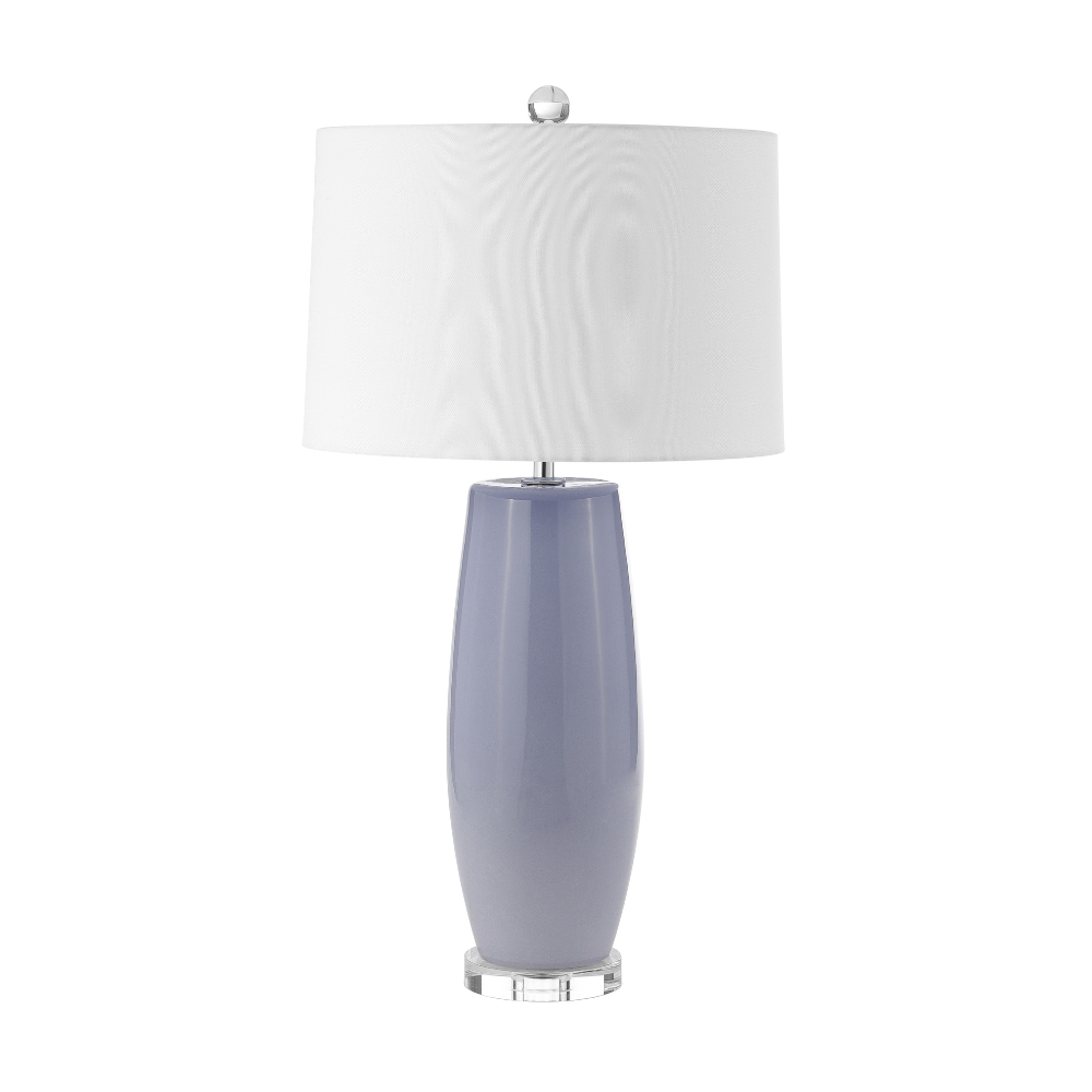 Ceramic table lamp with glossy soft-neutral ceramic base, clear acrylic foot, and white drum shade