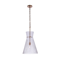 Modern pendant light featuring an oversized handcrafted crackled glass shade, antique brass finished hardware, chain suspension, and exposed Edison-style bulb.