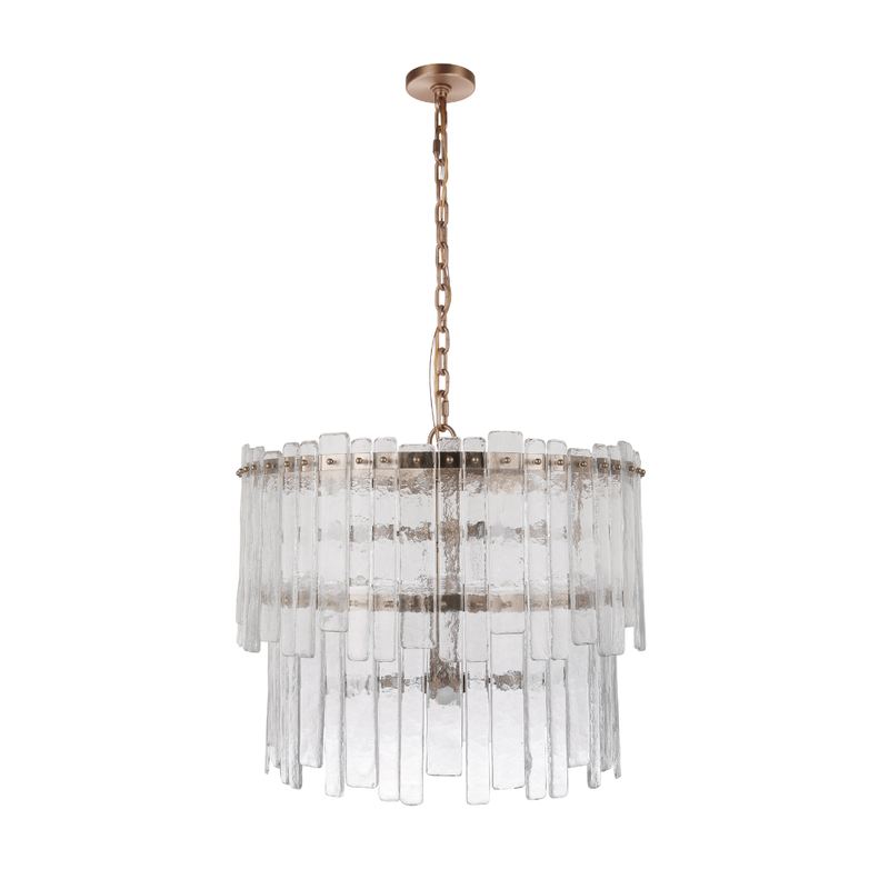 Tiered chandelier featuring textured clear ice glass panels suspended from an aged brass frame and chain