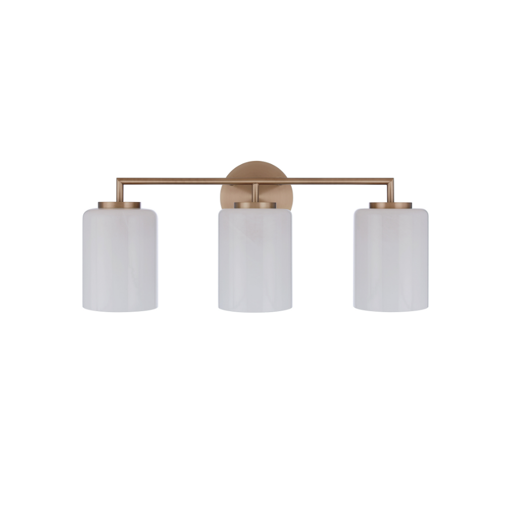 Modern 3-light bathroom vanity light featuring antique brass finish metal construction with three faux alabaster white glass cylinder shades in a minimalist transitional design.