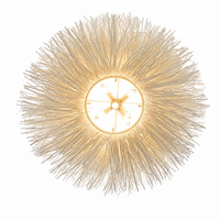 White rattan woven chandelier with layered curl design and soft ambient lighting