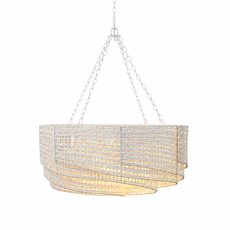White woven rattan chandelier with layered drum shade and warm ambient lighting