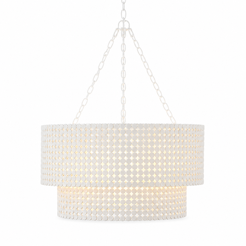Tiered beaded chandelier with metal chain suspension and warm ambient lighting