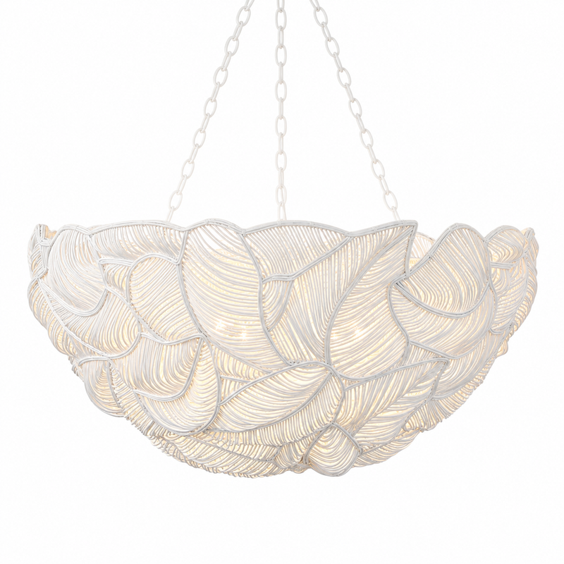 White sculptural chandelier with layered leaf-like design and soft ambient lighting