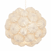 White coco bead chandelier with floral medallion design and soft ambient lighting